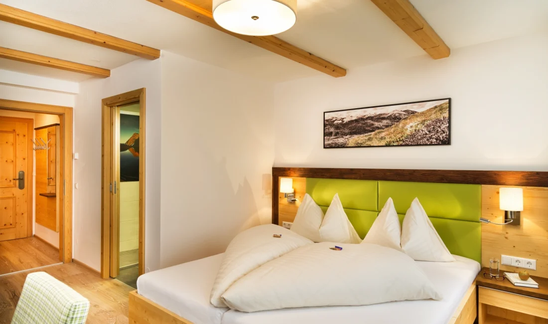Doppelzimmer Alpenrose Bett